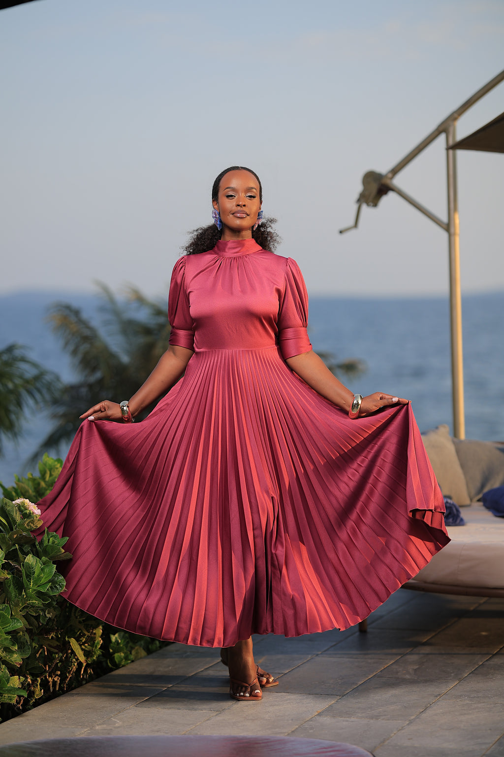 The Suubi Burgundy Pleated Maxi Dress