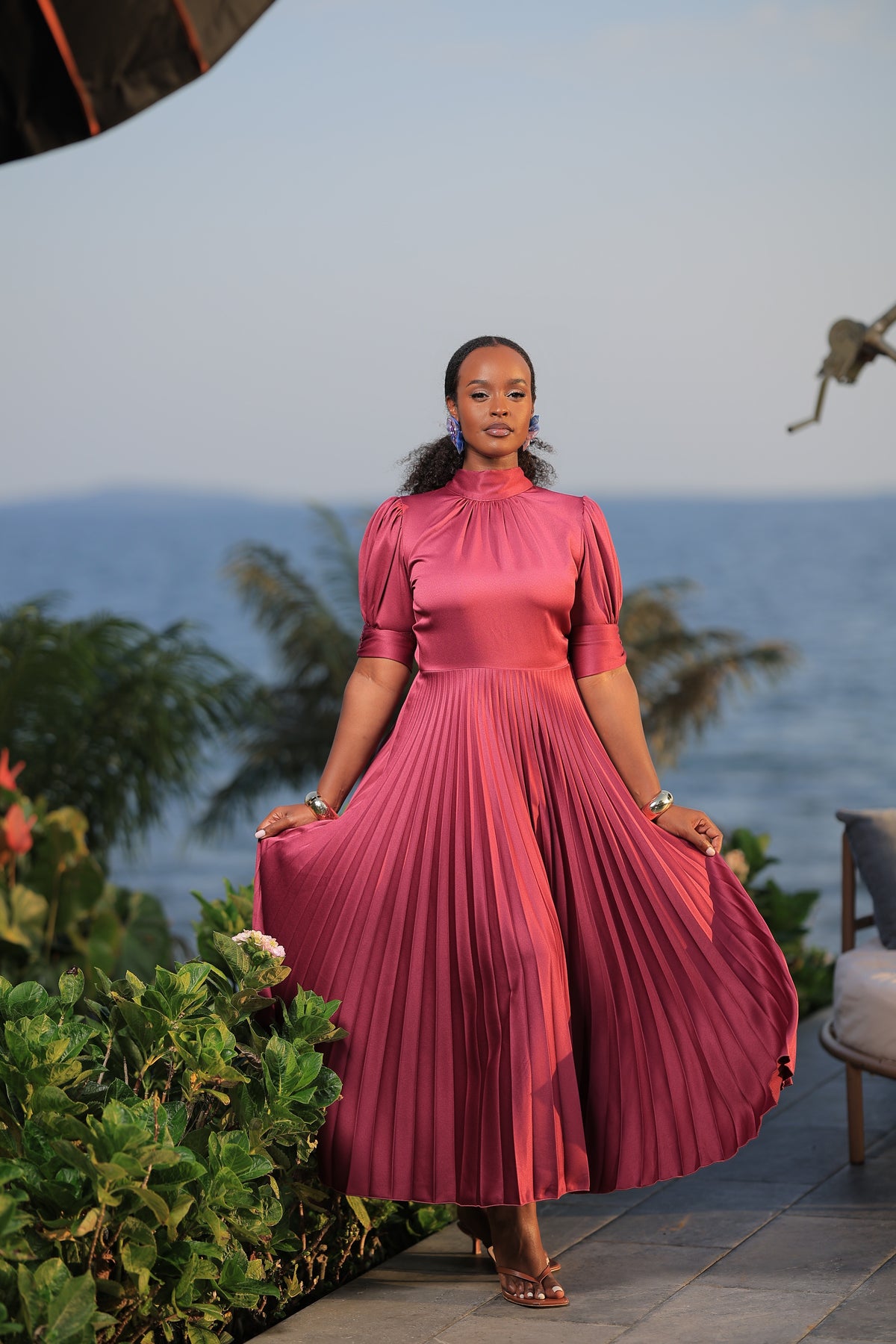 The Suubi Burgundy Pleated Maxi Dress