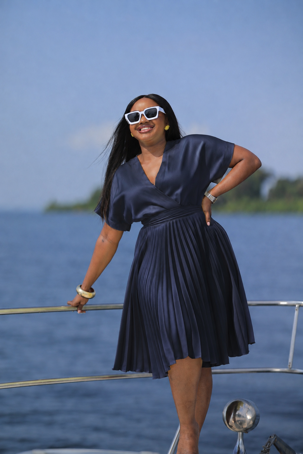 The Kora Navy Kimono Wrap Pleated Skater Dress