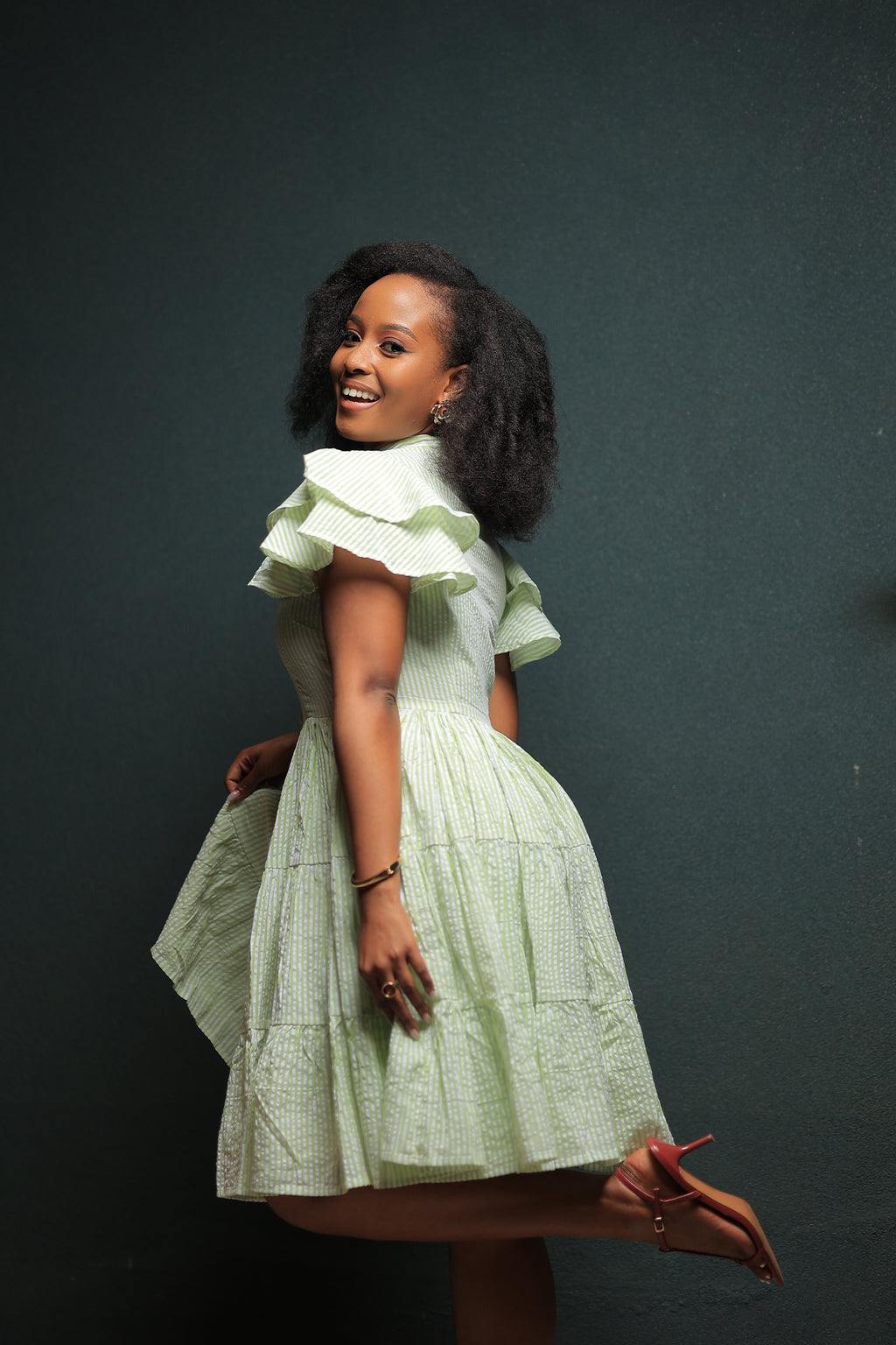 The Kansiime Green Pin Stripped Mini Dress