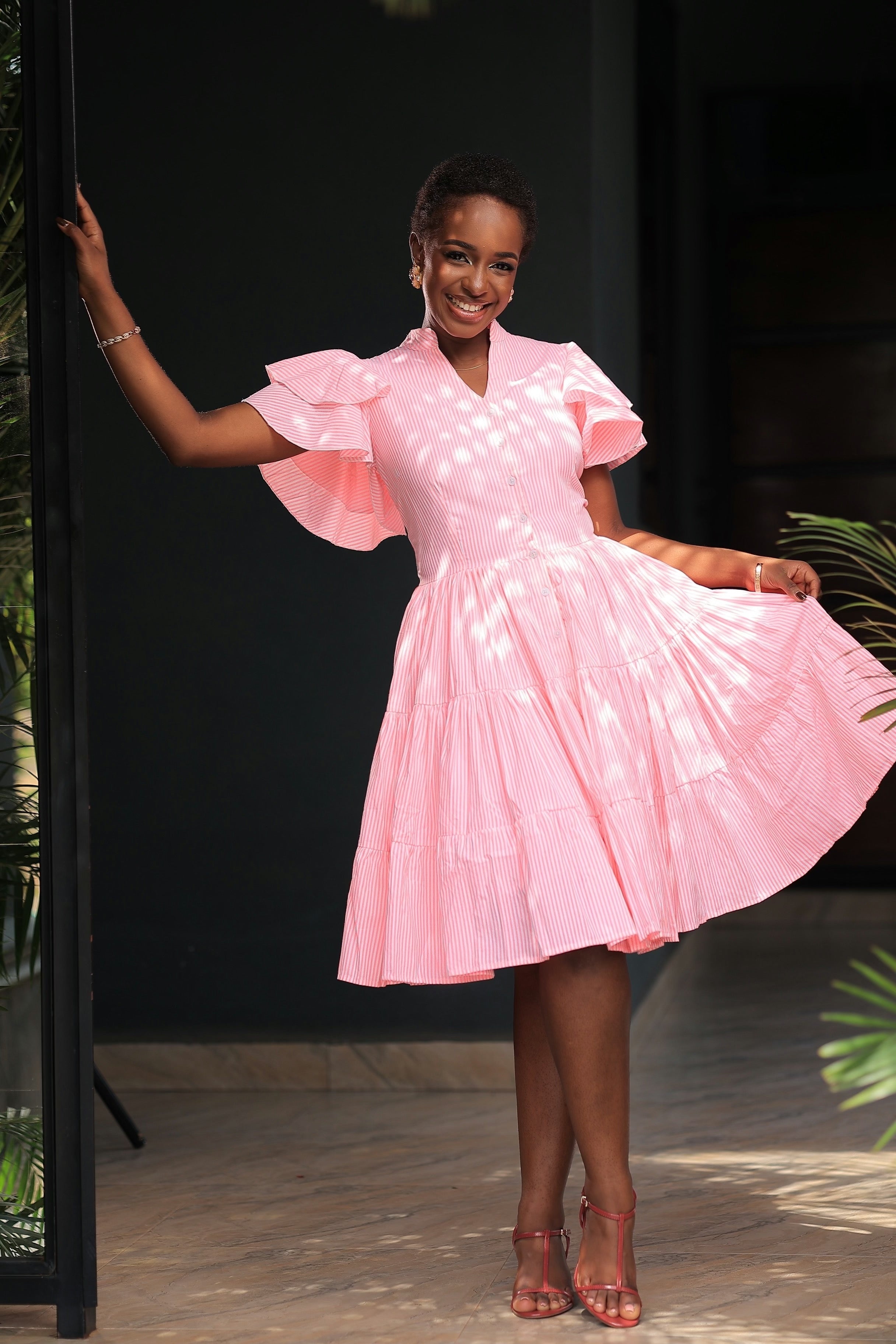 The Kansime Pink Pin Stripped Mini Dress