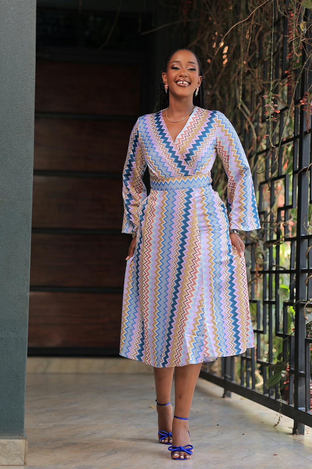 The Nankunda Purple Print Wrap Dress.