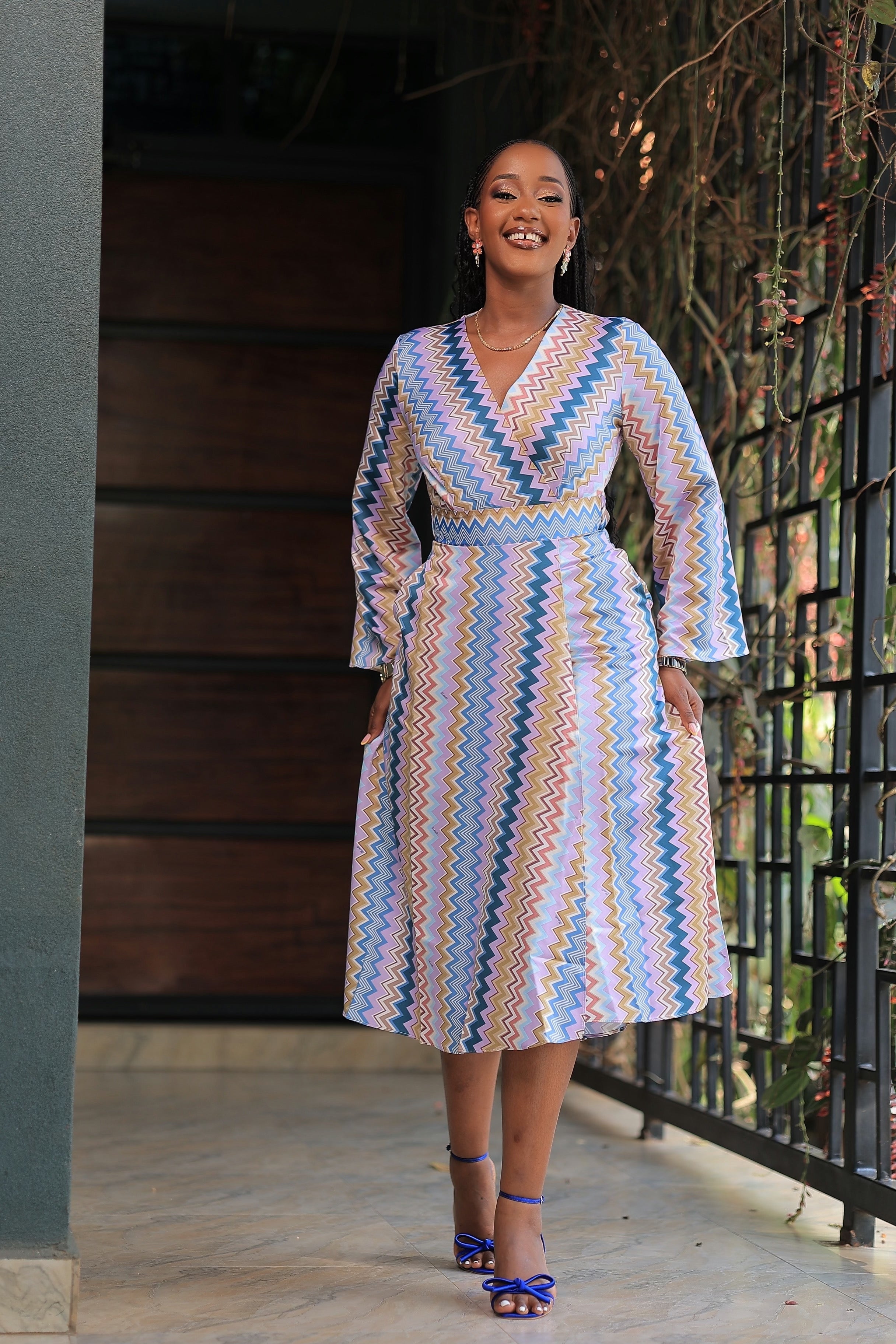 The Nankunda Purple Print Wrap Dress.