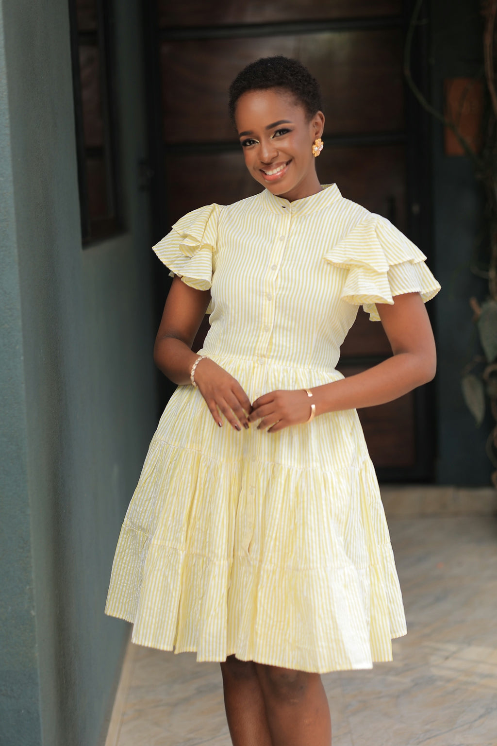 The Kansiime Cream Pin Stripped Sleeveless Mini Dress