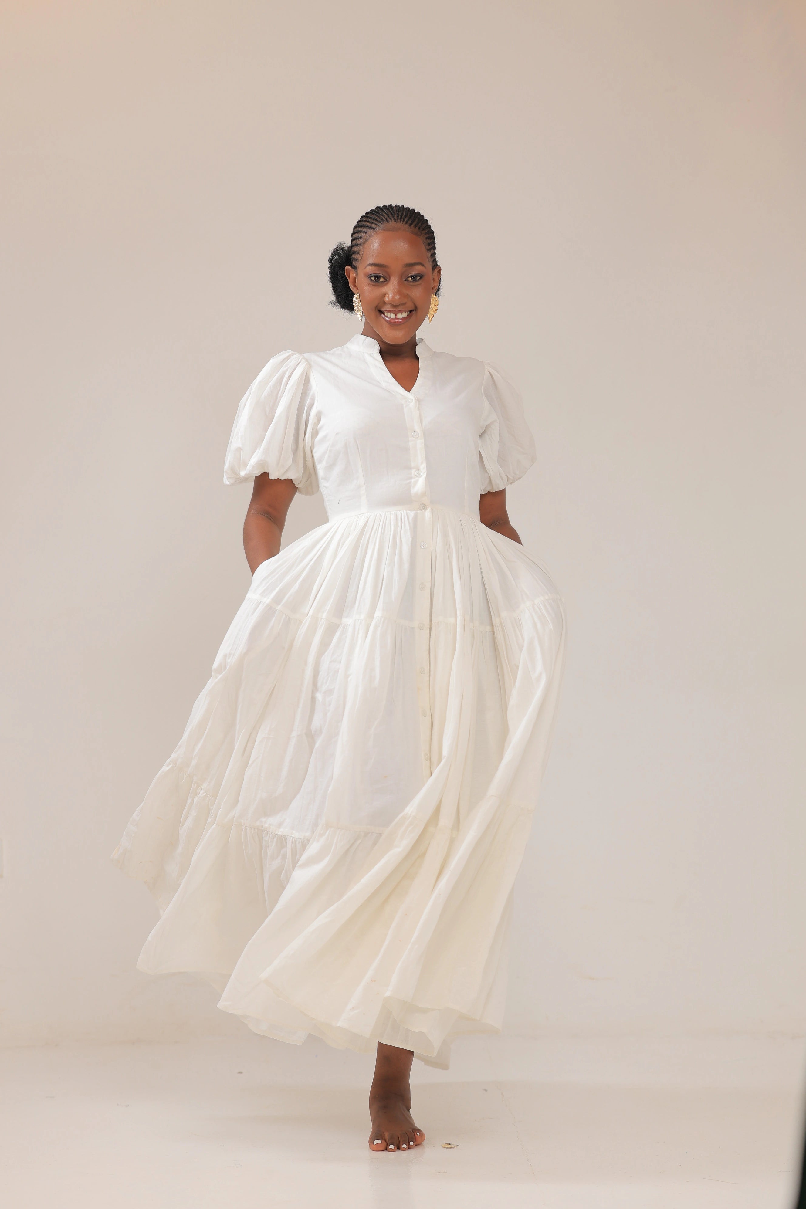 The Izuba volume sleeve white maxi dress