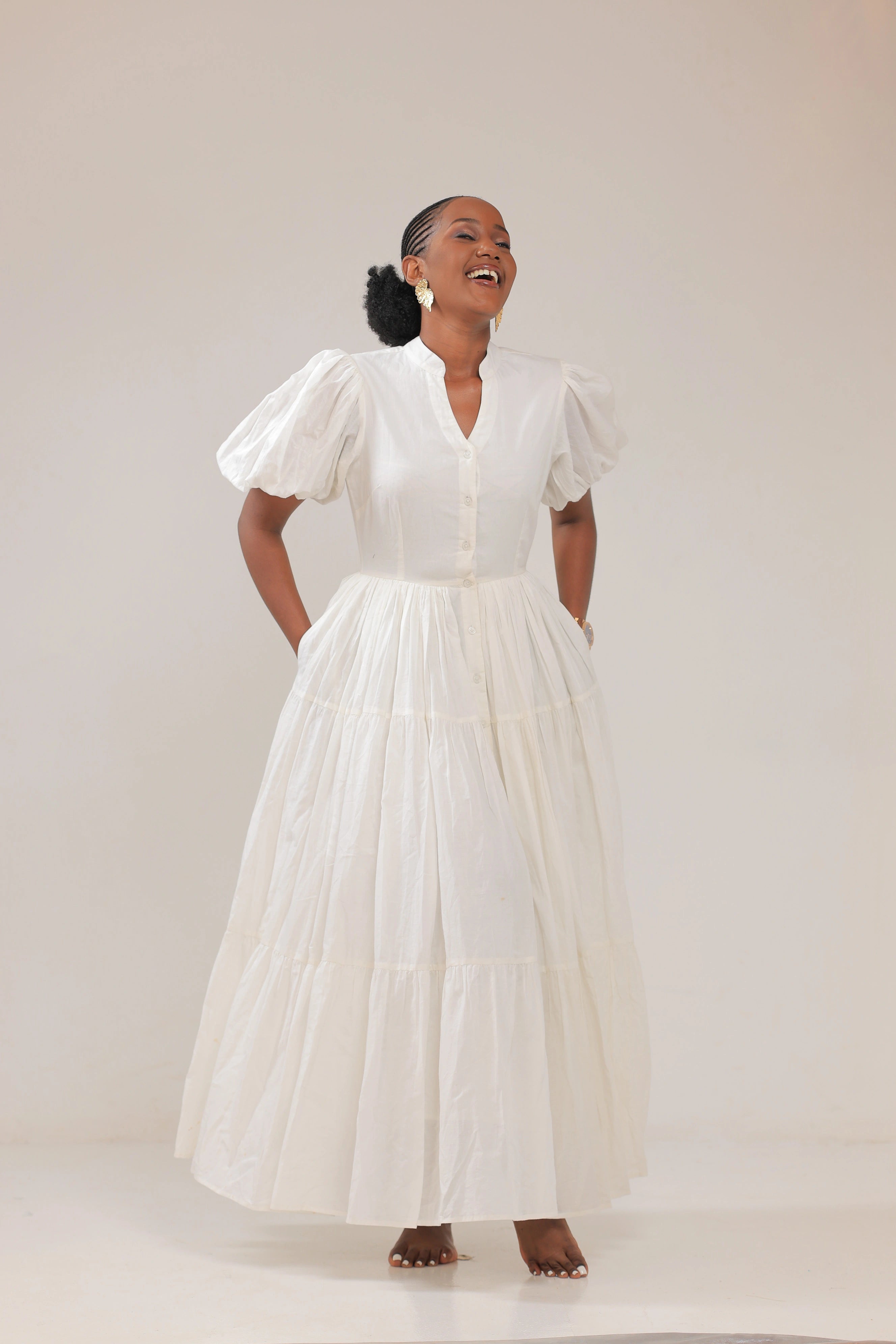 The Izuba volume sleeve white maxi dress