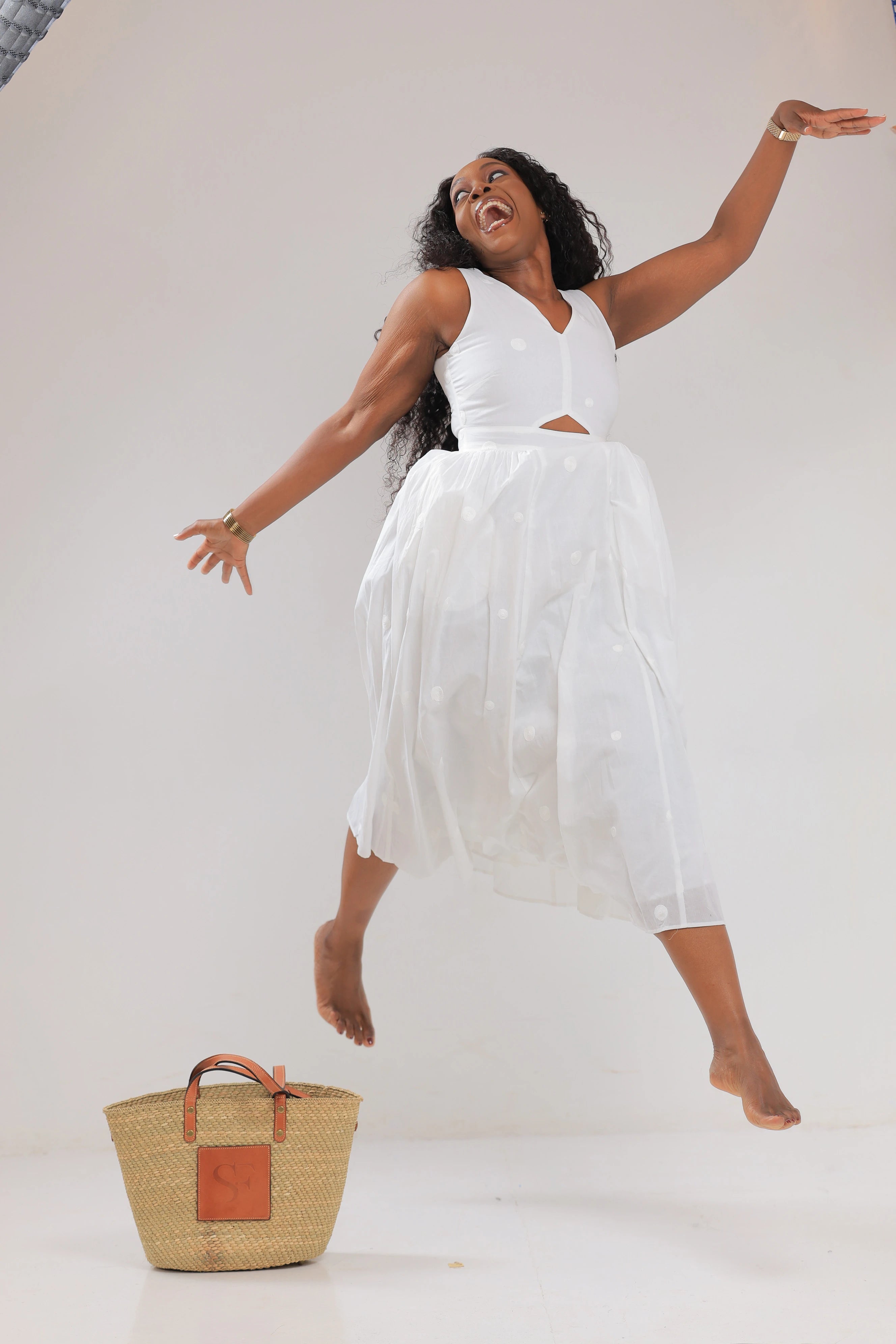 The Nyali vneck white skater dress