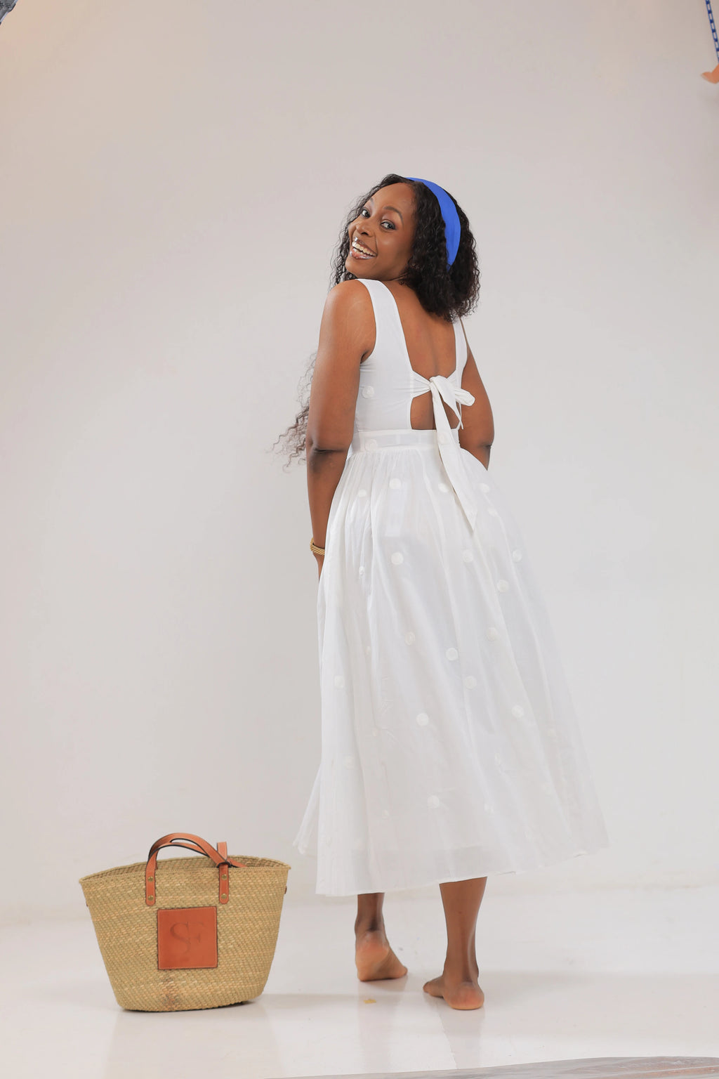 The Nyali vneck white skater dress
