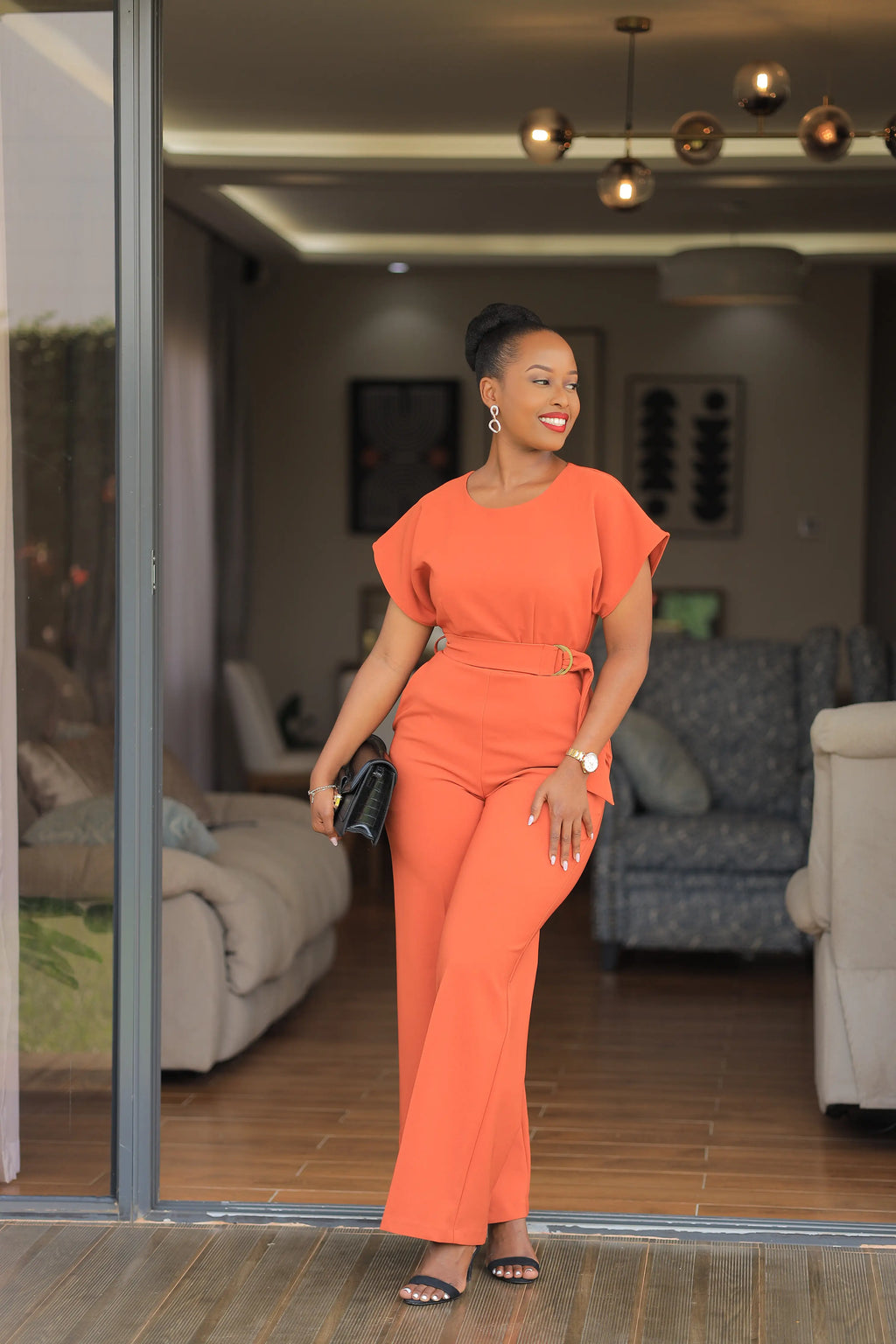 The isimbi belted Orange jumpsuit